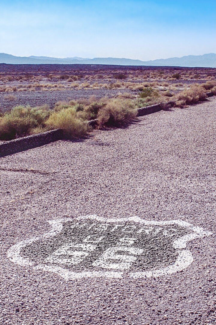 USA Route 66 pavement in Amboy California Spotlight Sojourns