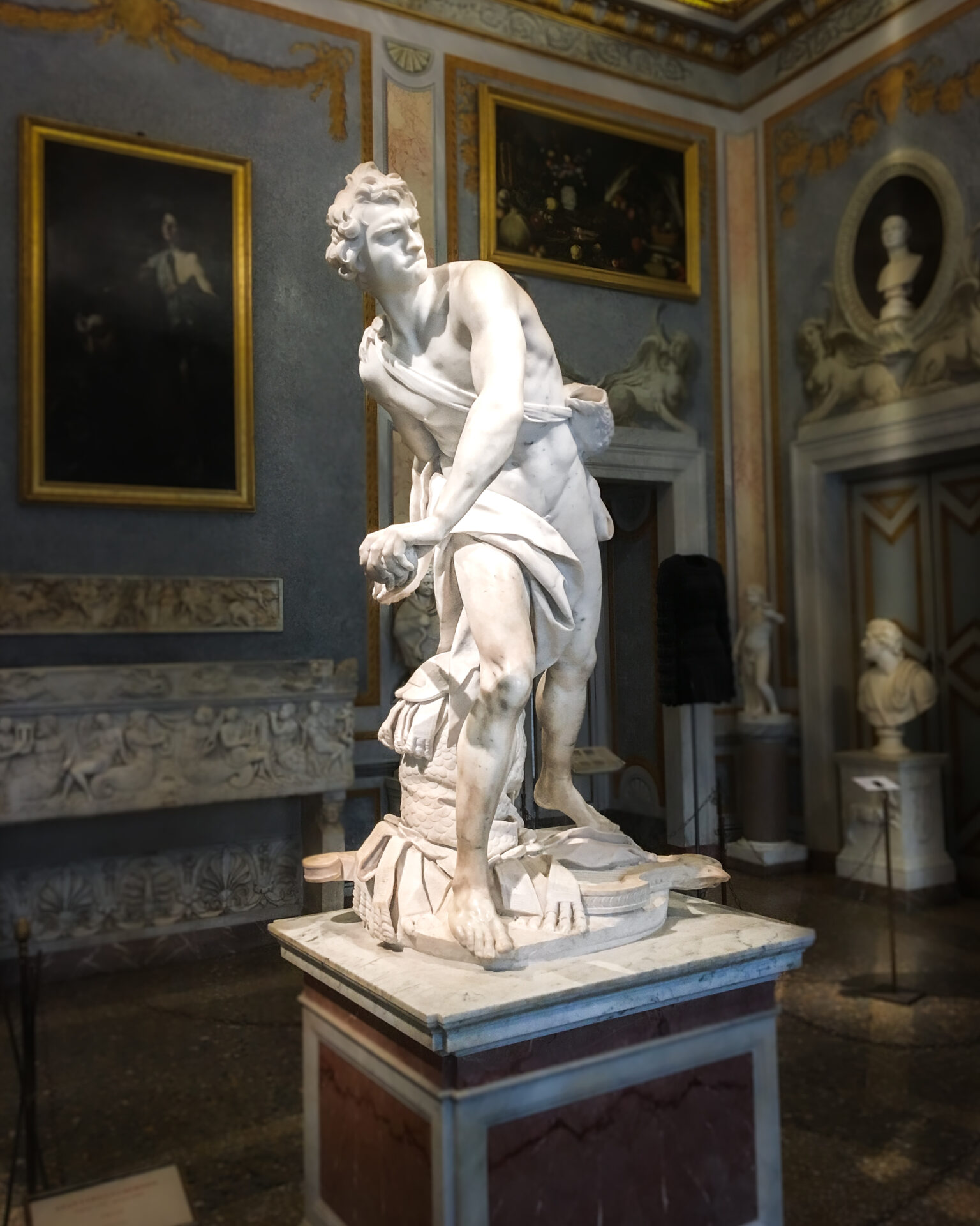 Interior of Villa Borgese and Bernini's David marble sculpture in Rome, Italy