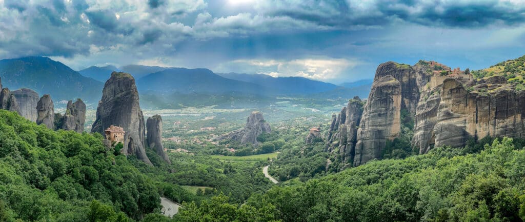 The most unique of Greece's famous landmarks are the churches built on the rock formations of Meteora, with the giant stone pillars rising from the green lush valley below