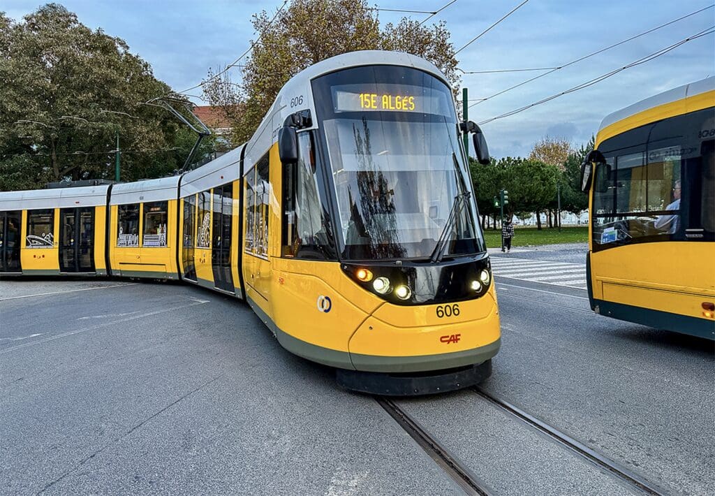 Lisbon's yellow electric tram and bus