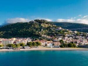 A view of the mountains and water from the ocean.