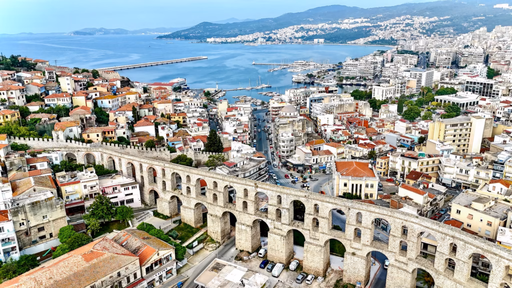 A view of the city from above shows an old bridge.