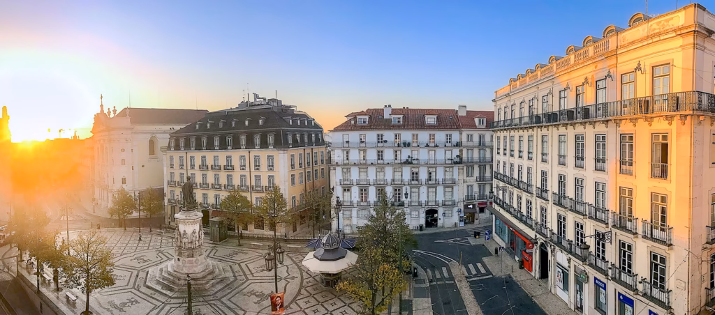 For ultimate Lisbon travel tips, catch the rising sun at Luis de Camoes Square