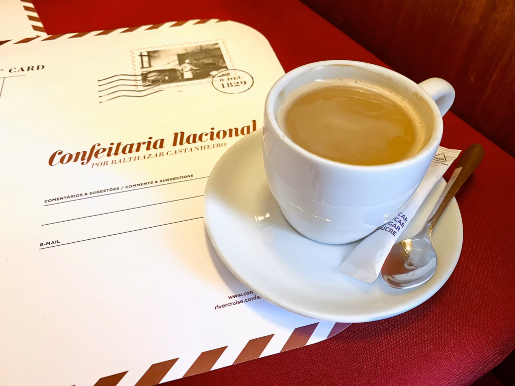 A cup of coffee sitting on top of a saucer.