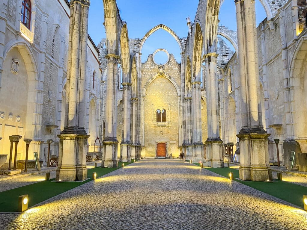 Dramatic lighting highilights the building structure of this roofless Gothic church, turned into an archaeolgical museum