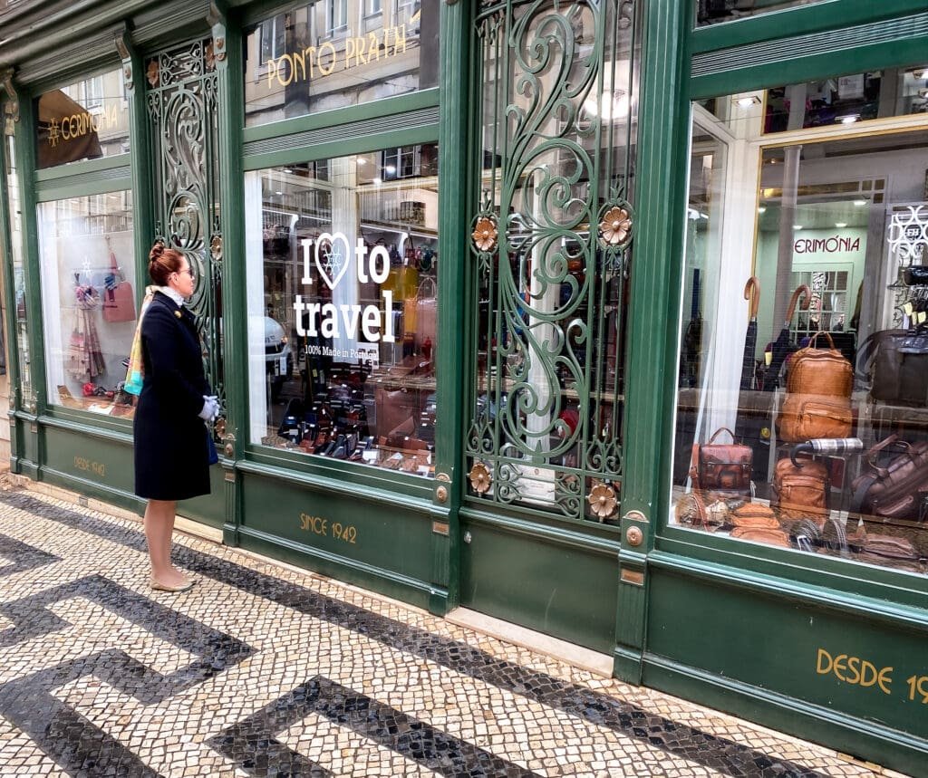 Window shopping in Lisbons shopping district of Baixa