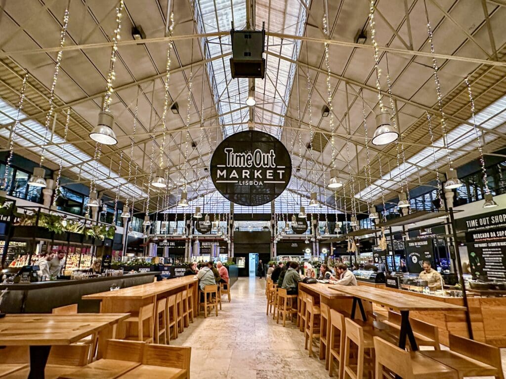 Inside the building of TimeOut Market Lisboa, featuiring traditional Portuguese cuisine. A place you can go every day on your 3 day visit in Lisbon Portugal