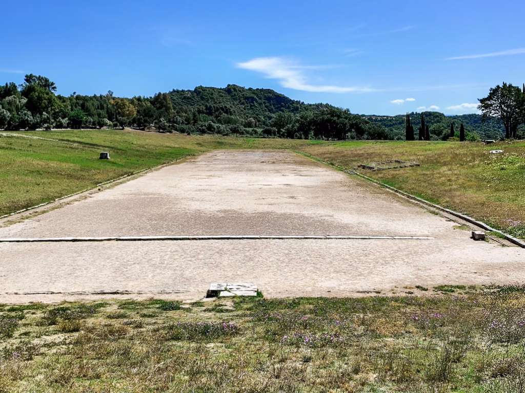 Archaeological site of the dirt foot race track at The Stadium of Ancient Olympia Greece. Photo by Paul Kostadimas © SpotlightSojourns.com