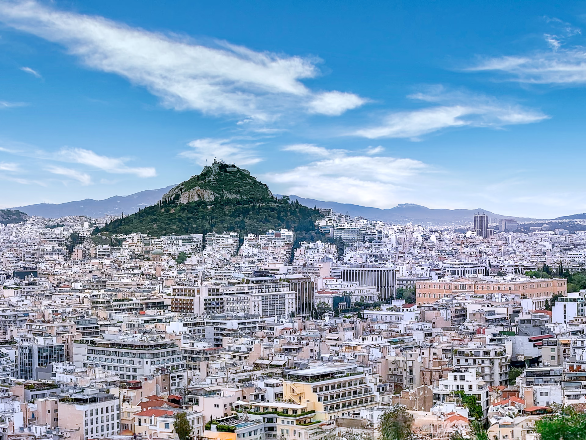 Scenic view of Athens Greece featuring Lycabettus Hill © Spotlight Sojourns