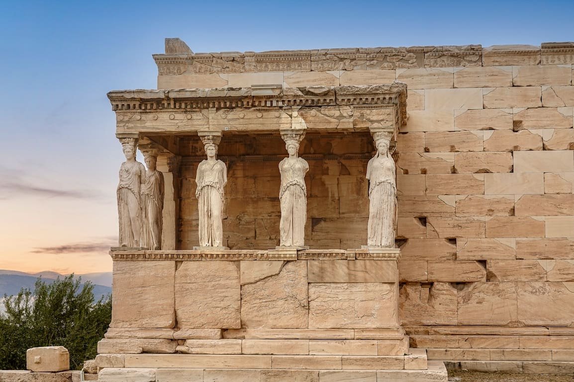 The Temple of Erechtheion is a significant landmark on the Acropolis of Athens Greece. Photo by Paul Kostadimas © SpotlightSojourns.com