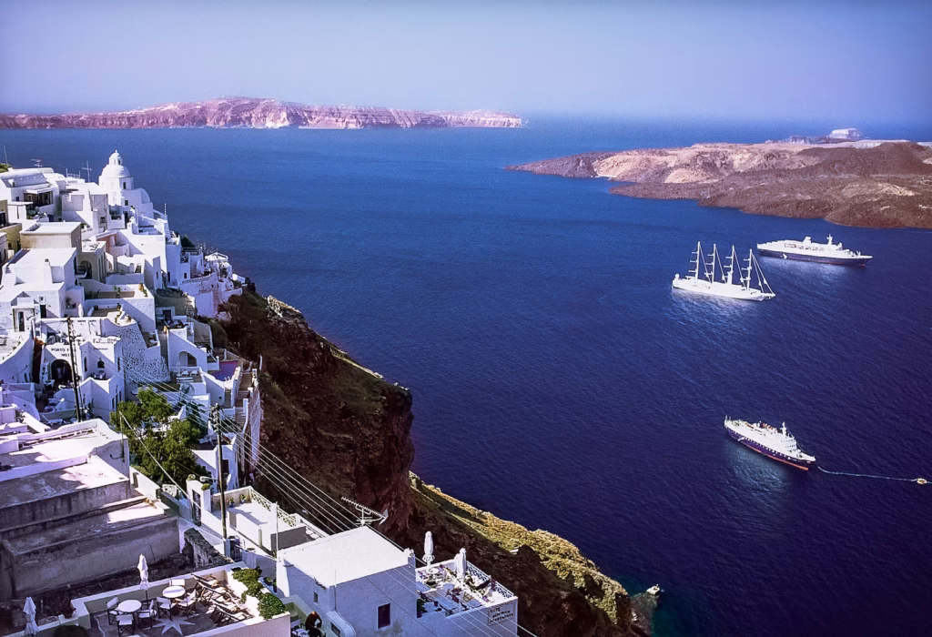 View of Oia with the ships in the Caldera in Santorini Greece