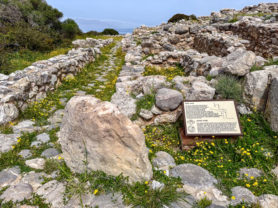 Building ruins, walls and a baetyl, sacred stone, in Crete's archaeological site of Gournia