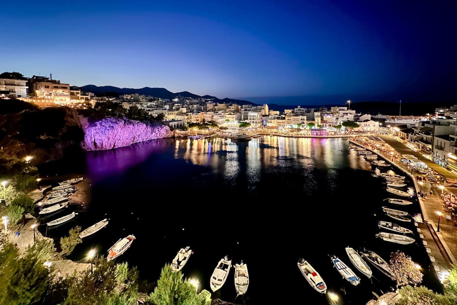 Nightime photo of Lake Voulismeni and the lakefront restaurants