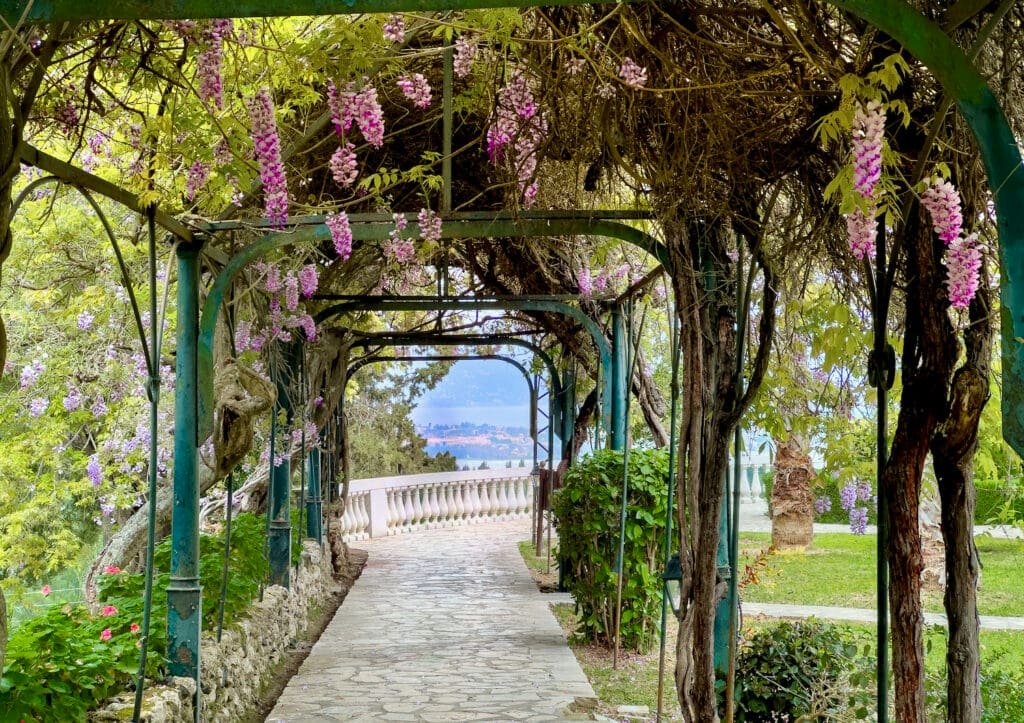 Blooming garden in spring in Empress Elisabeth's Villa in Corfu