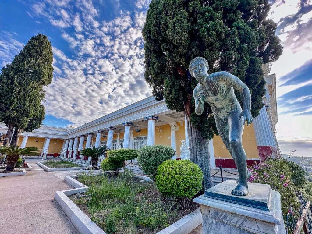 Image of a bronze statue known as "The Runner" in the gardens of the Achilleion Palace on the island of Corfu, Greece. 