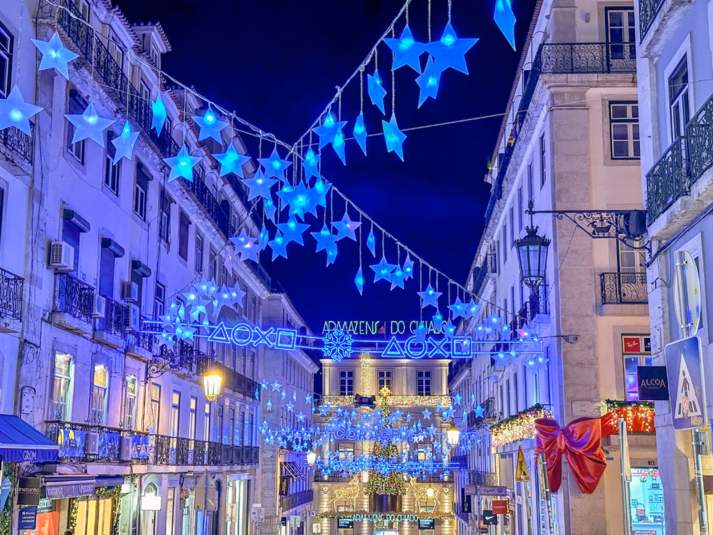 Festive Christmas lights over the streets in the neighborhood of Chiado in Lisbon, Portugal