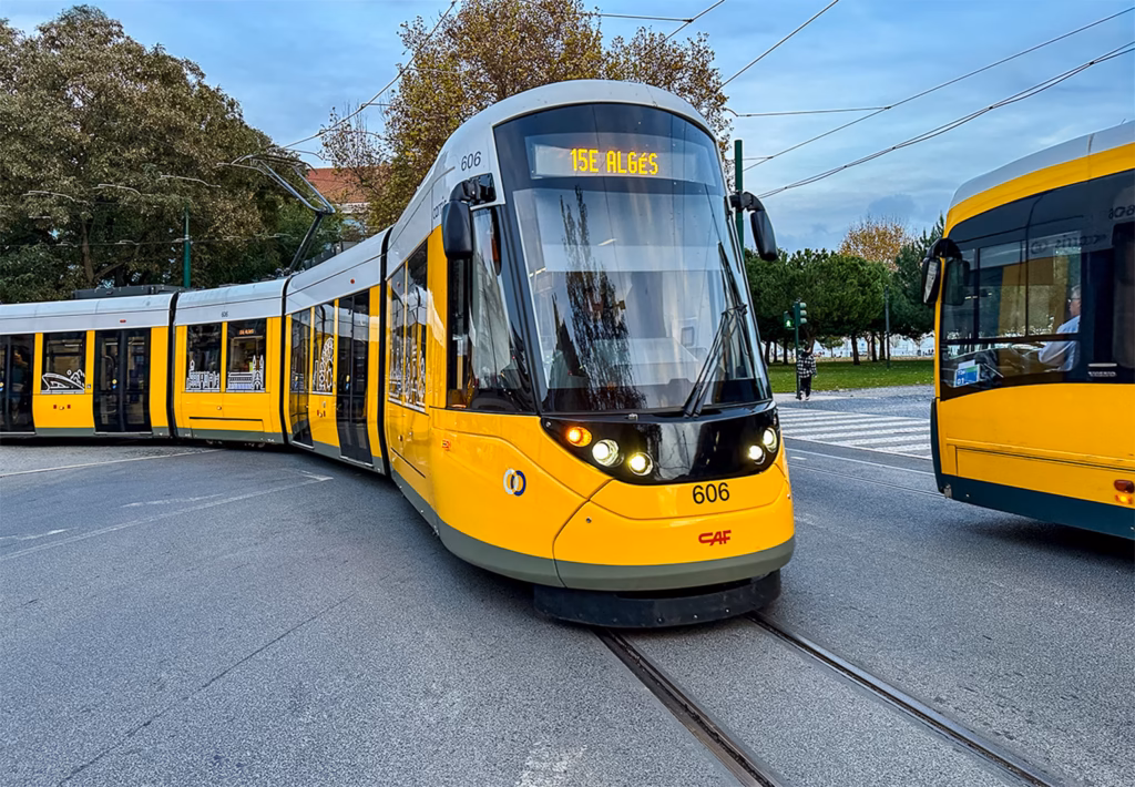 Lisbon's yellow electric tram and bus