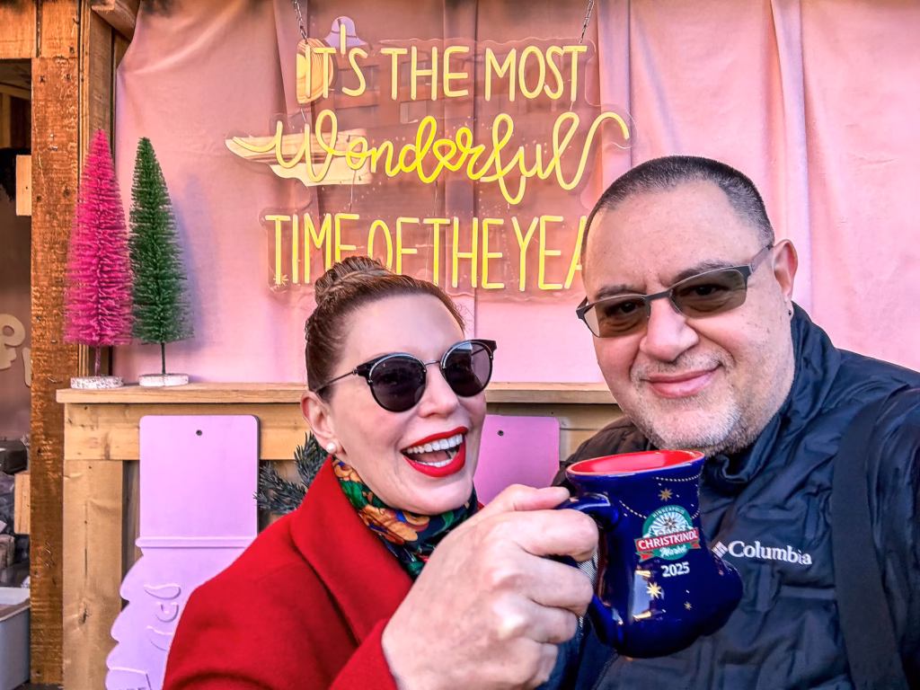 The authors of the blog enjoying some hot chocolate in a Ceramic boot Christkindl mug