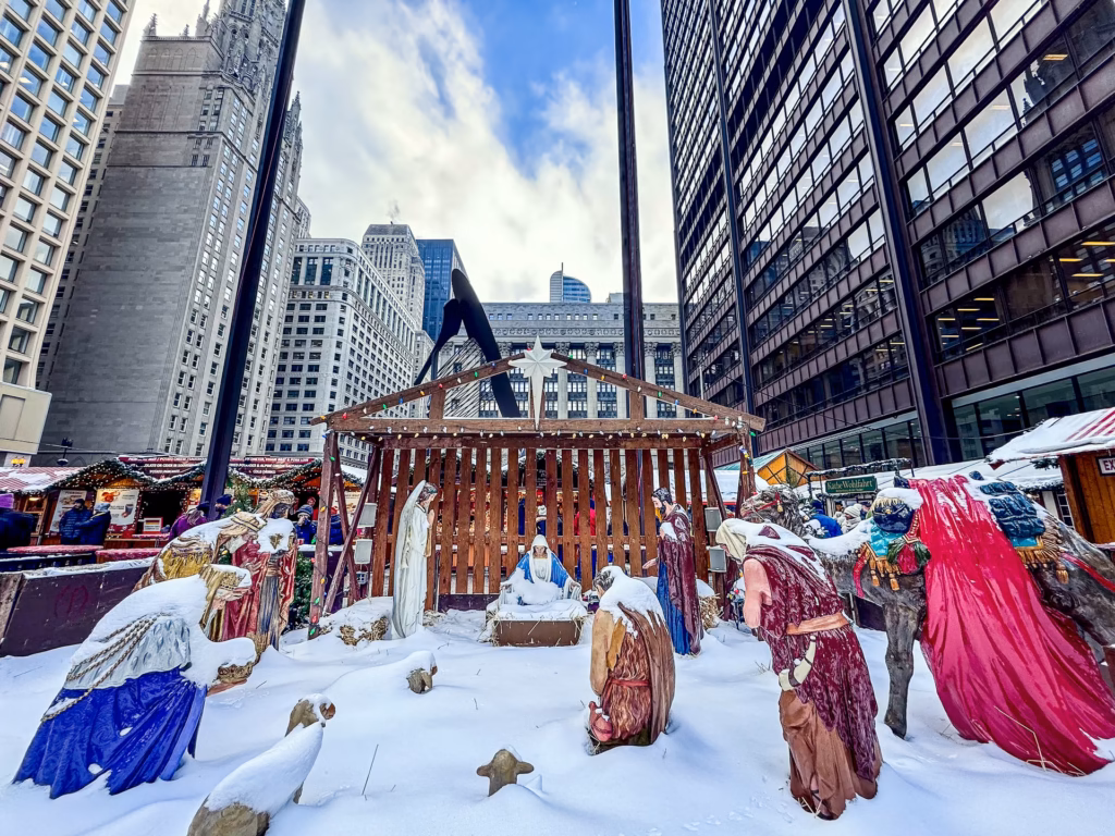 Lifesize nativity scene amongst the skyskrapers of downtown Chicago