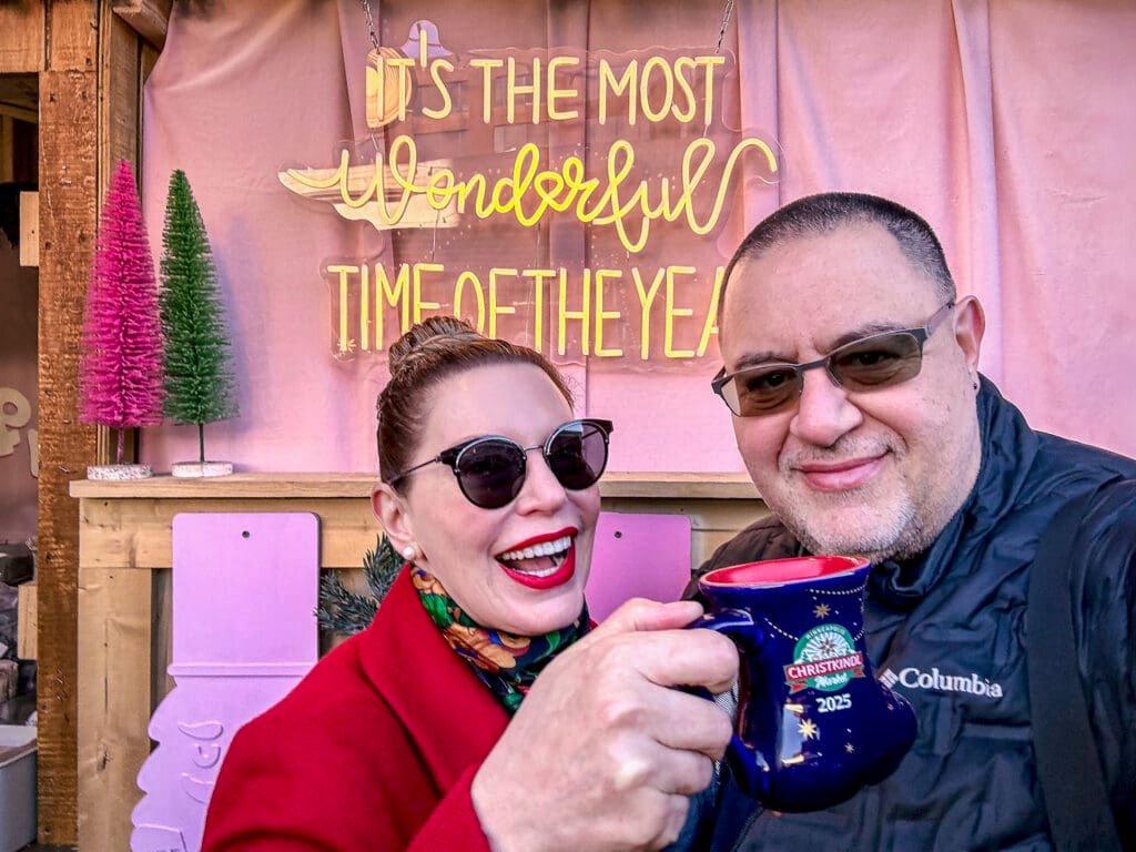 The authors of the blog enjoying some hot chocolate in a Ceramic boot Christkindl mug
