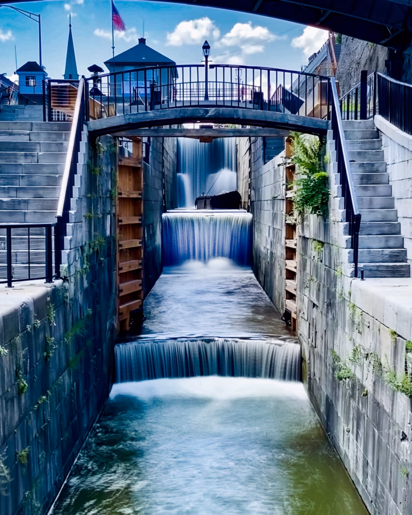 Erie Canal's Flight Of Five Locks with replica packet boat in Lockport, New York