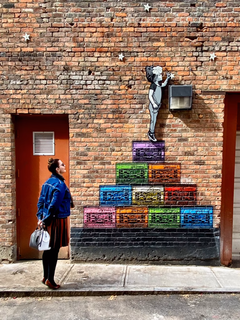 Alley in Troy New York with playful murals is another slice of life on the Erie Canal.