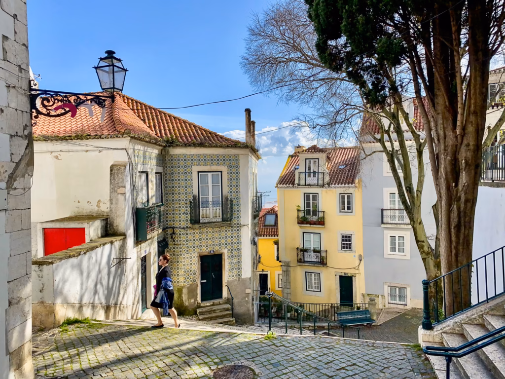 Explore the old neighborhood of Alfama when visiting Lisbon