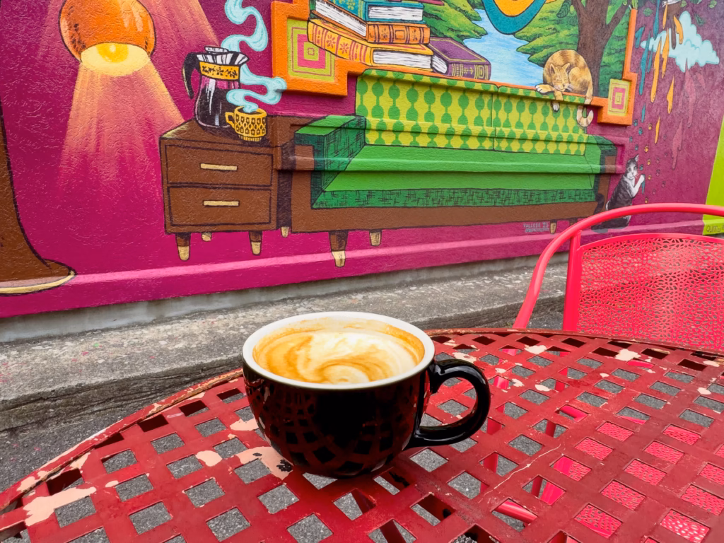 The flagship wall mural of Utica Coffee Roasting Company in historic downtown Utica near the Erie Canal.